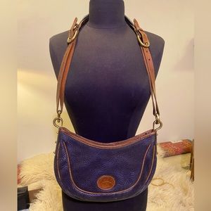 Dooney & Bourke Navy and Tan Pebble Crossbody bag